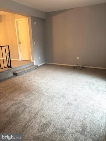 a view of a room with an empty space