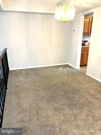 a kitchen with stainless steel appliances granite countertop a stove and a microwave
