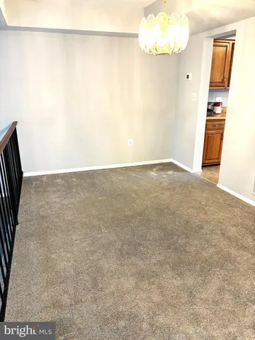 a kitchen with stainless steel appliances granite countertop a stove and a microwave