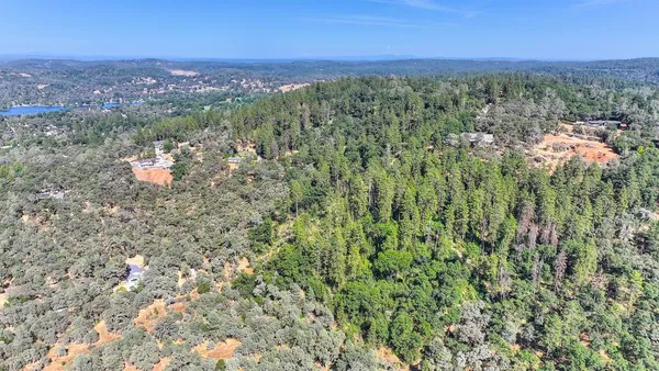 a view of a city with mountain