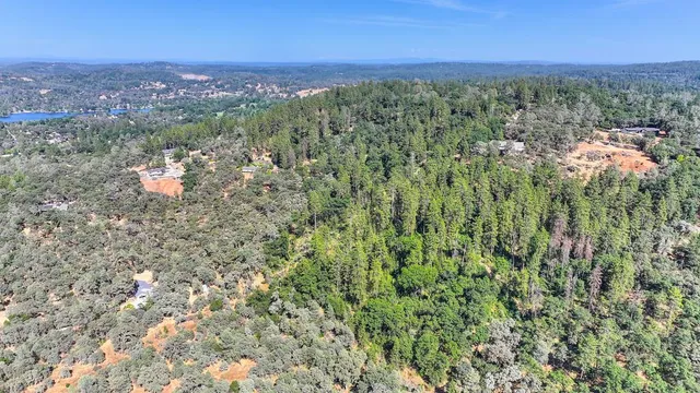 a view of a city with mountain