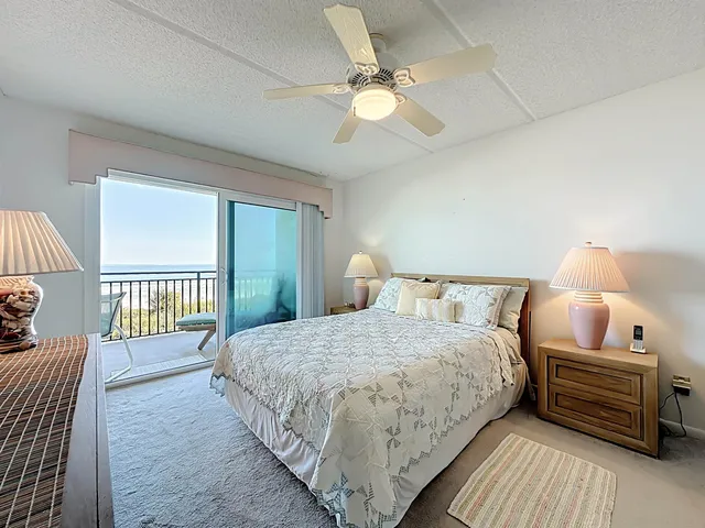 a large bathroom with a tub a sink and mirror