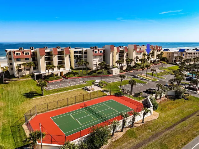 a view of hallway with wooden floor
