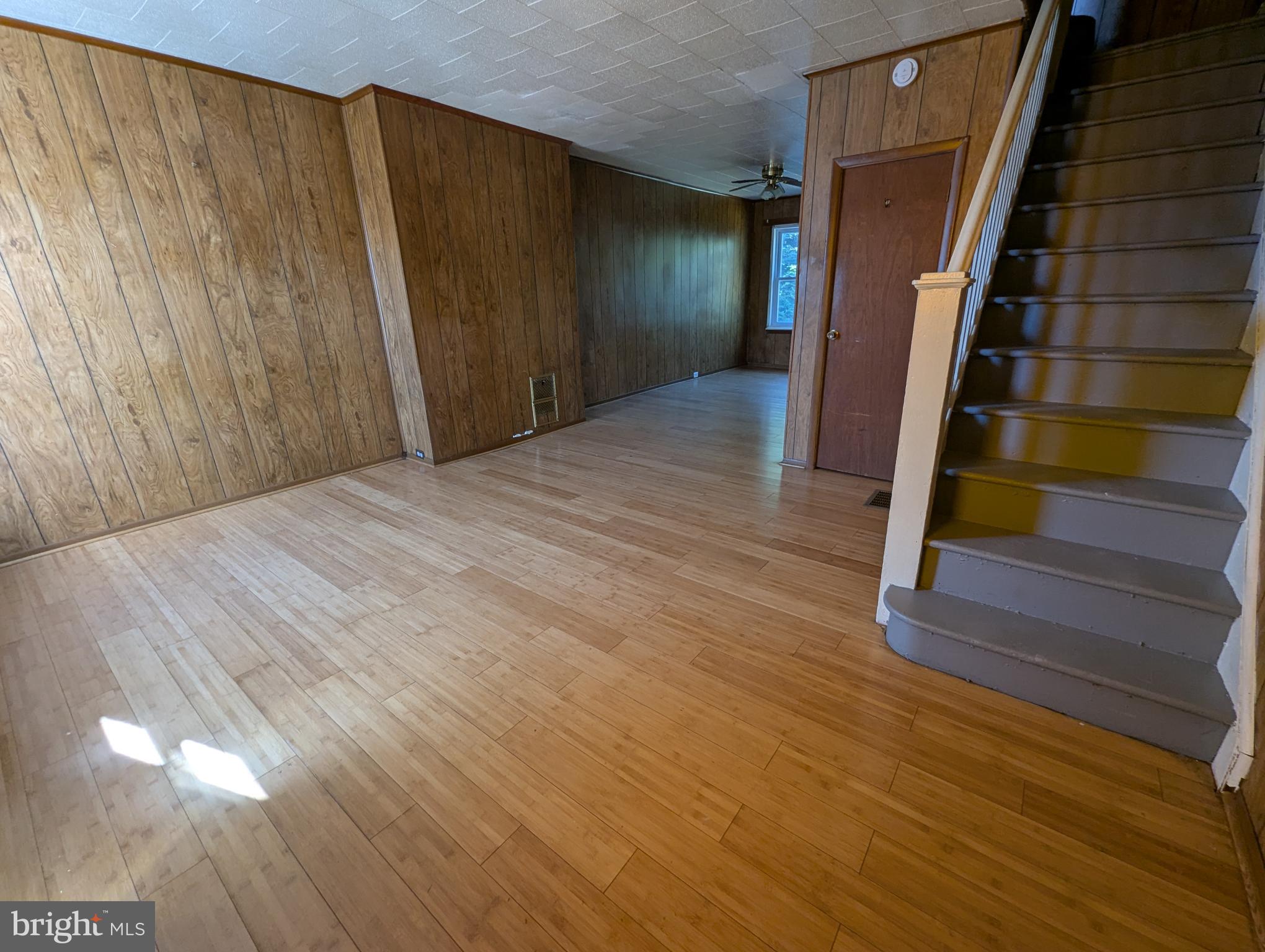 2650 South 68th Street Philadelphia, PA 19142 - Photo 3 of 12 a view of entryway with wooden floor