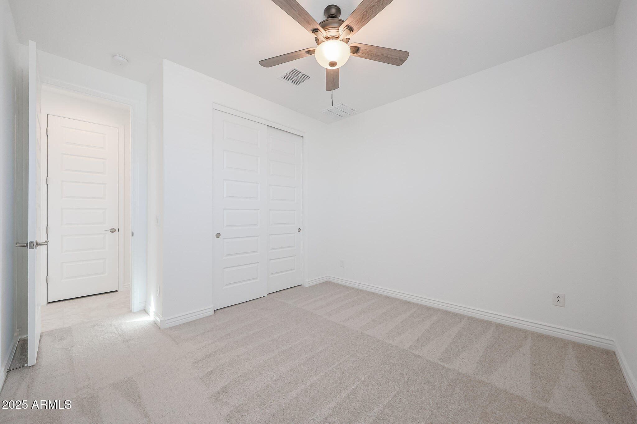25110 North 170th Lane Surprise, AZ 85387 - Photo 12 of 20 a view of an empty room