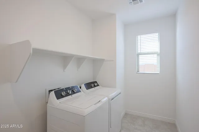 a view of a backyard with a garden and plants