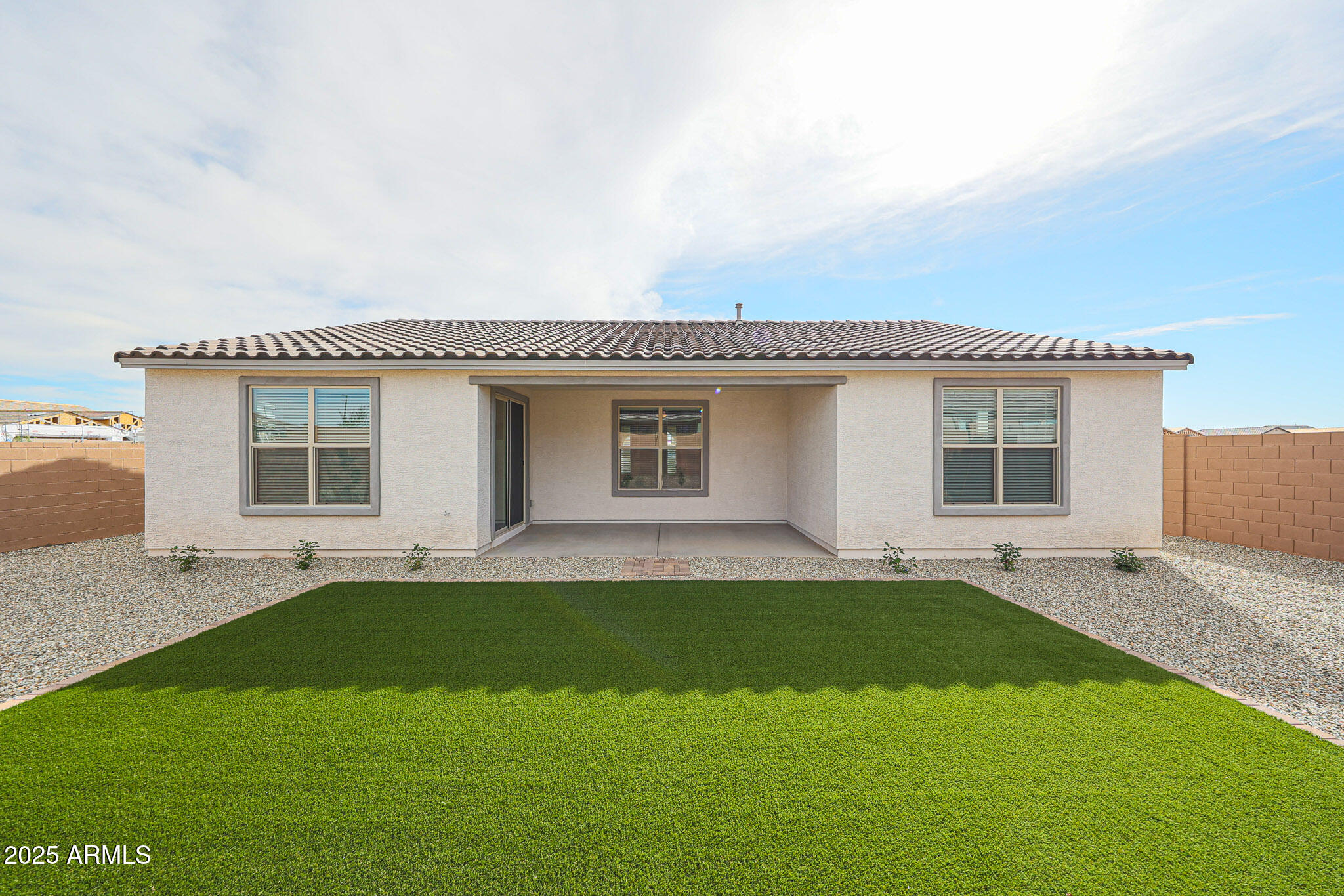 25110 North 170th Lane Surprise, AZ 85387 - Photo 19 of 20 a view of a house with a yard and garage