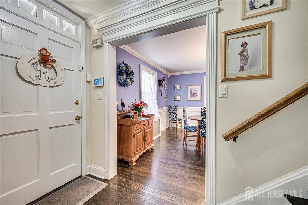 137 5th Street Edison, NJ 08837 - Photo 13 of 52 a hallway with wooden floor