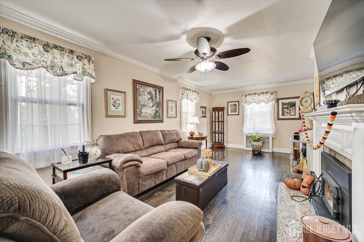 137 5th Street Edison, NJ 08837 - Photo 25 of 52 a living room with furniture and a large window