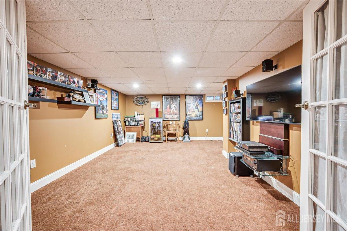 137 5th Street Edison, NJ 08837 - Photo 39 of 52 a view of a room with gym equipment