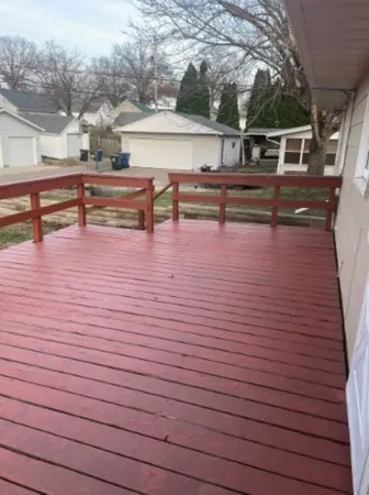 a view of a terrace with wooden floor
