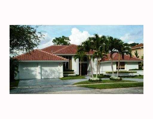 3205 Northwest 59th Street Boca Raton, FL 33496 - Photo 1 of 23 a front view of a house with a yard