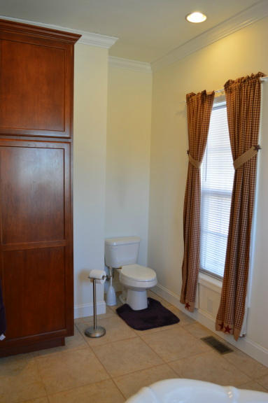 357 Sam Reed Road Northwest Floyd, VA 24091 - Photo 20 of 105 a bathroom with a toilet