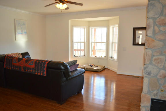 357 Sam Reed Road Northwest Floyd, VA 24091 - Photo 26 of 105 a living room with furniture and a window