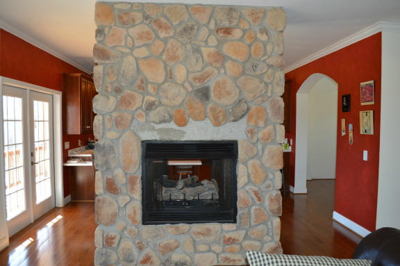 357 Sam Reed Road Northwest Floyd, VA 24091 - Photo 27 of 105 a living room with furniture a fireplace and a fireplace