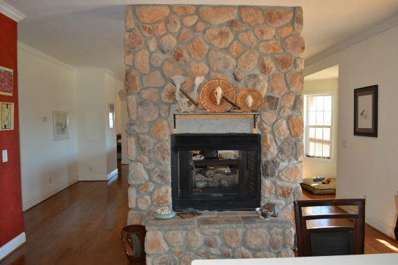 357 Sam Reed Road Northwest Floyd, VA 24091 - Photo 28 of 105 a living room with furniture and a fireplace