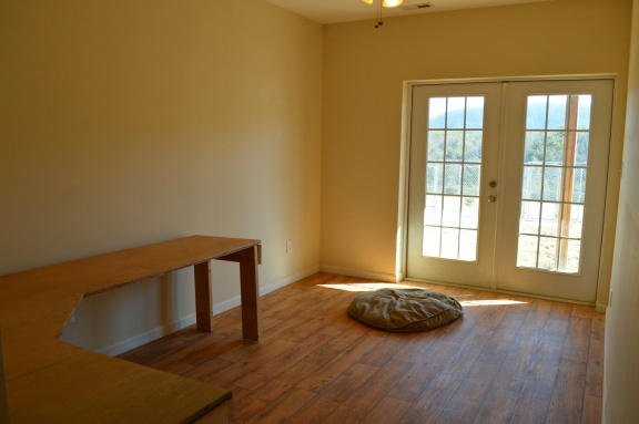 357 Sam Reed Road Northwest Floyd, VA 24091 - Photo 36 of 105 a view of a room with wooden floor and a window