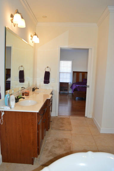 357 Sam Reed Road Northwest Floyd, VA 24091 - Photo 38 of 105 a large bathroom with a sink and a mirror