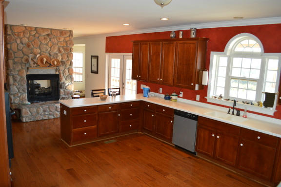 357 Sam Reed Road Northwest Floyd, VA 24091 - Photo 7 of 105 a spacious bathroom with a double vanity sink a two mirror and a large window