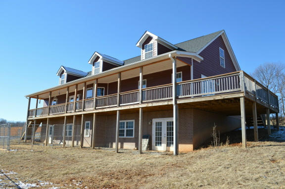 357 Sam Reed Road Northwest Floyd, VA 24091 - Photo 66 of 105 a front view of a house with windows