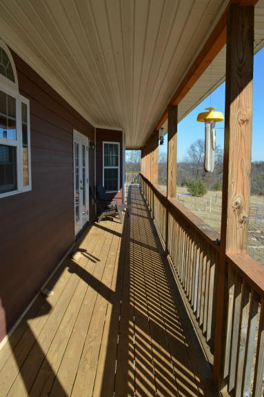 357 Sam Reed Road Northwest Floyd, VA 24091 - Photo 72 of 105 a view of a balcony with wooden floor
