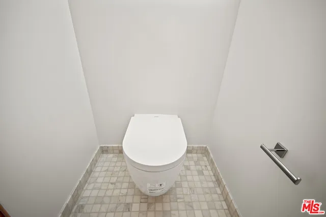 a view of kitchen with furniture and wooden floor