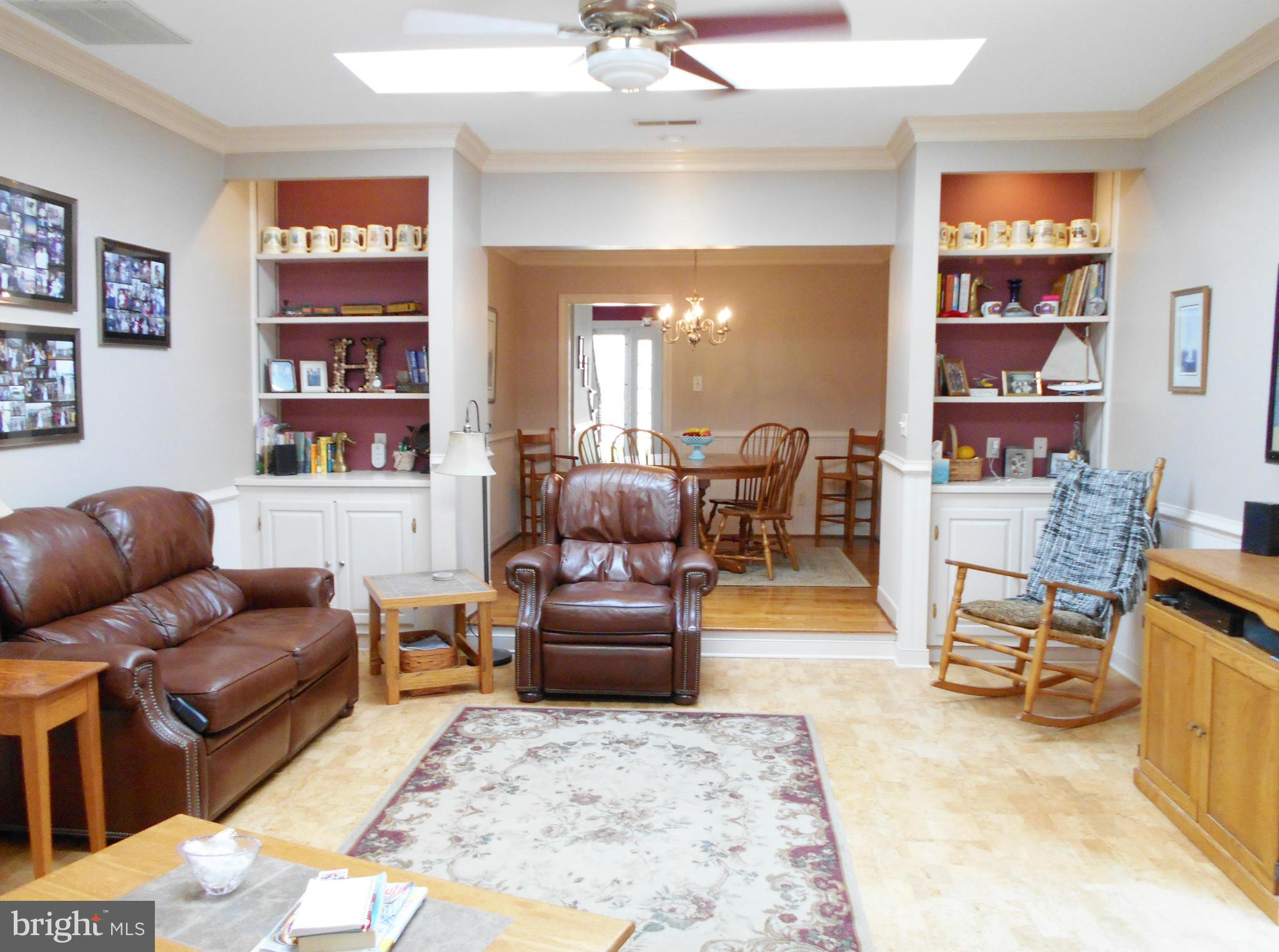 7415 Simms Landing Road Port Tobacco, MD 20677 - Photo 16 of 30 a living room with furniture and a flat screen tv