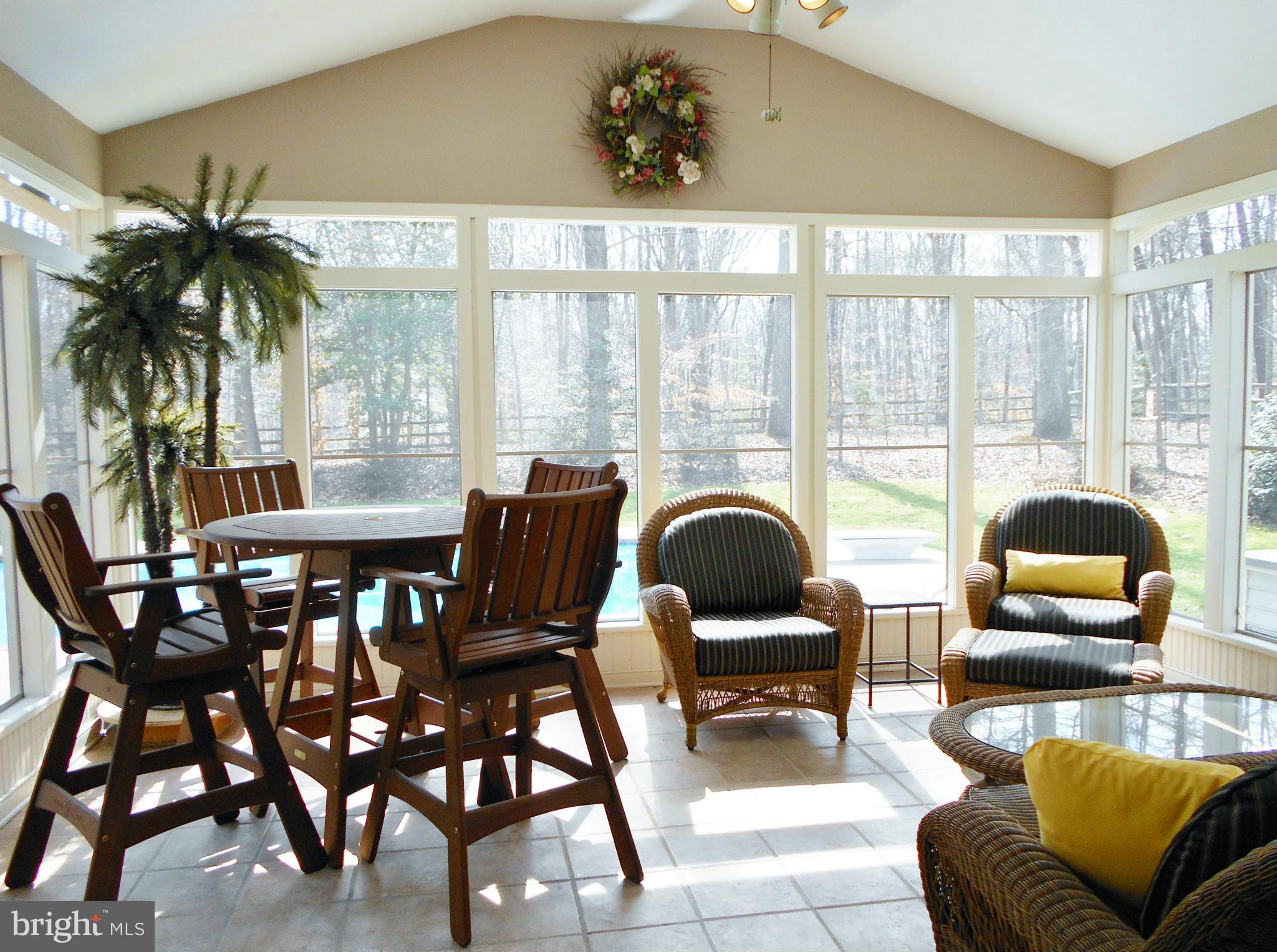 7415 Simms Landing Road Port Tobacco, MD 20677 - Photo 17 of 30 a dining room with furniture and window