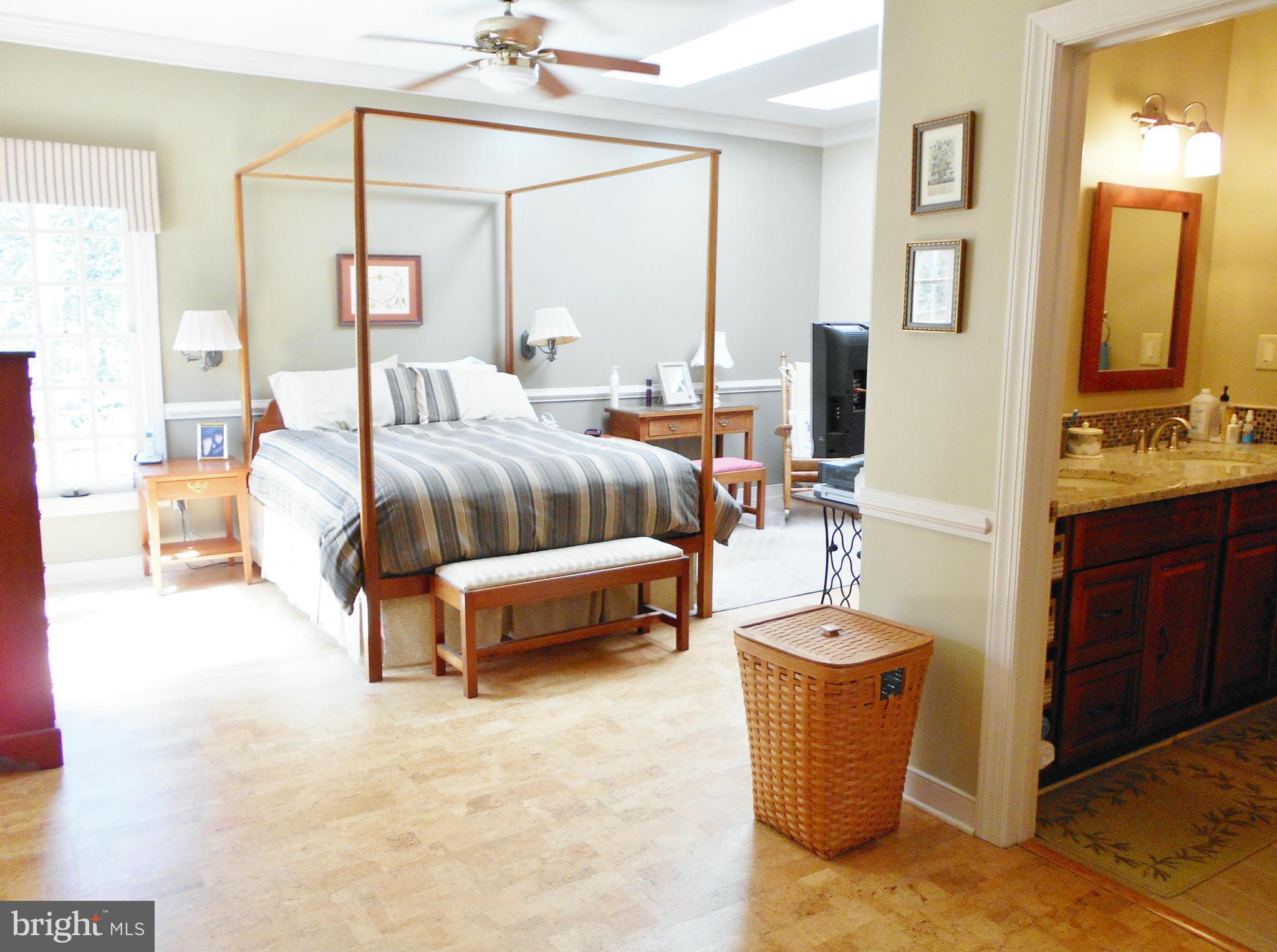 7415 Simms Landing Road Port Tobacco, MD 20677 - Photo 22 of 30 a bedroom with a bed and a dresser