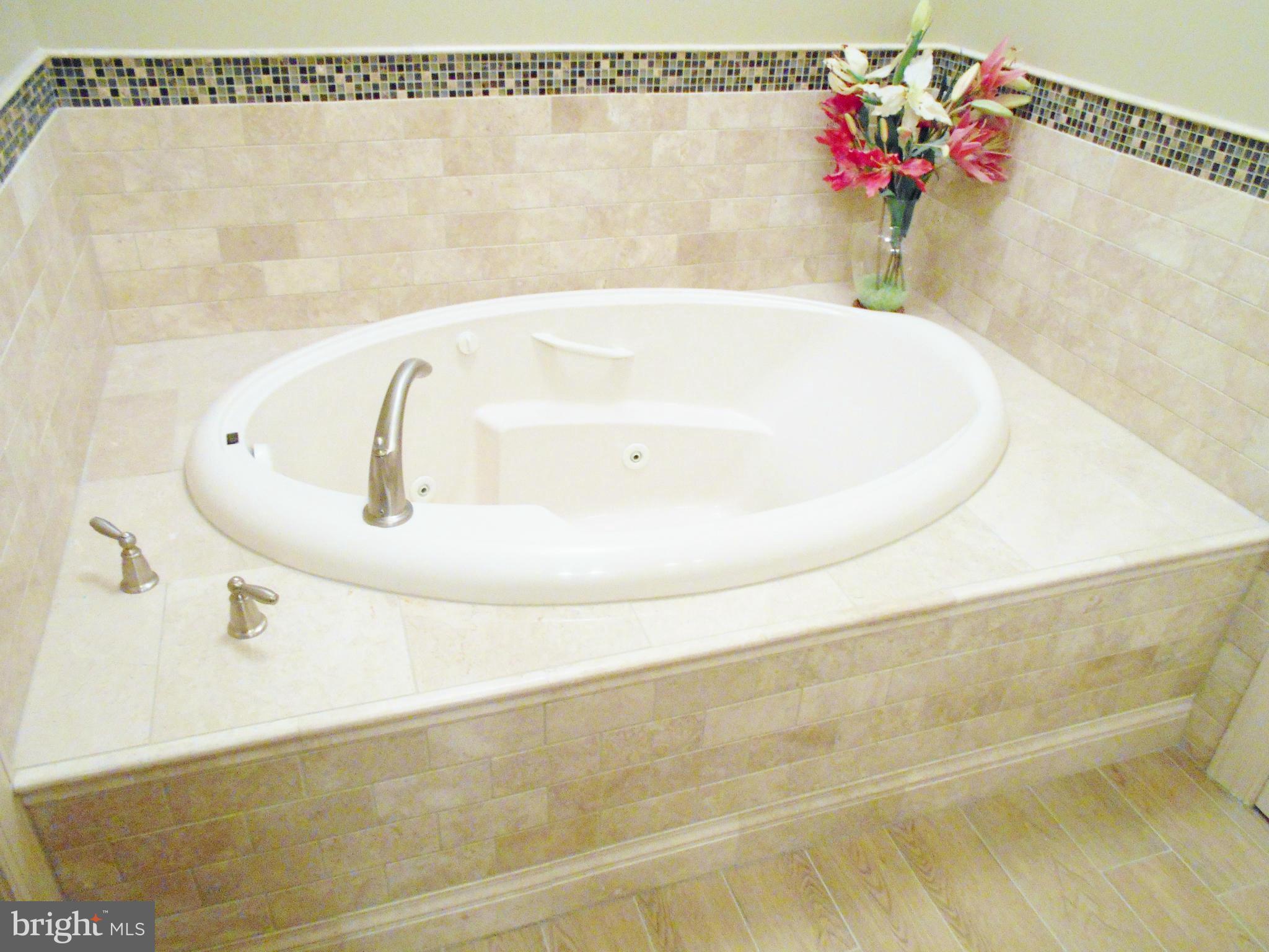7415 Simms Landing Road Port Tobacco, MD 20677 - Photo 24 of 30 a bathroom with a shower