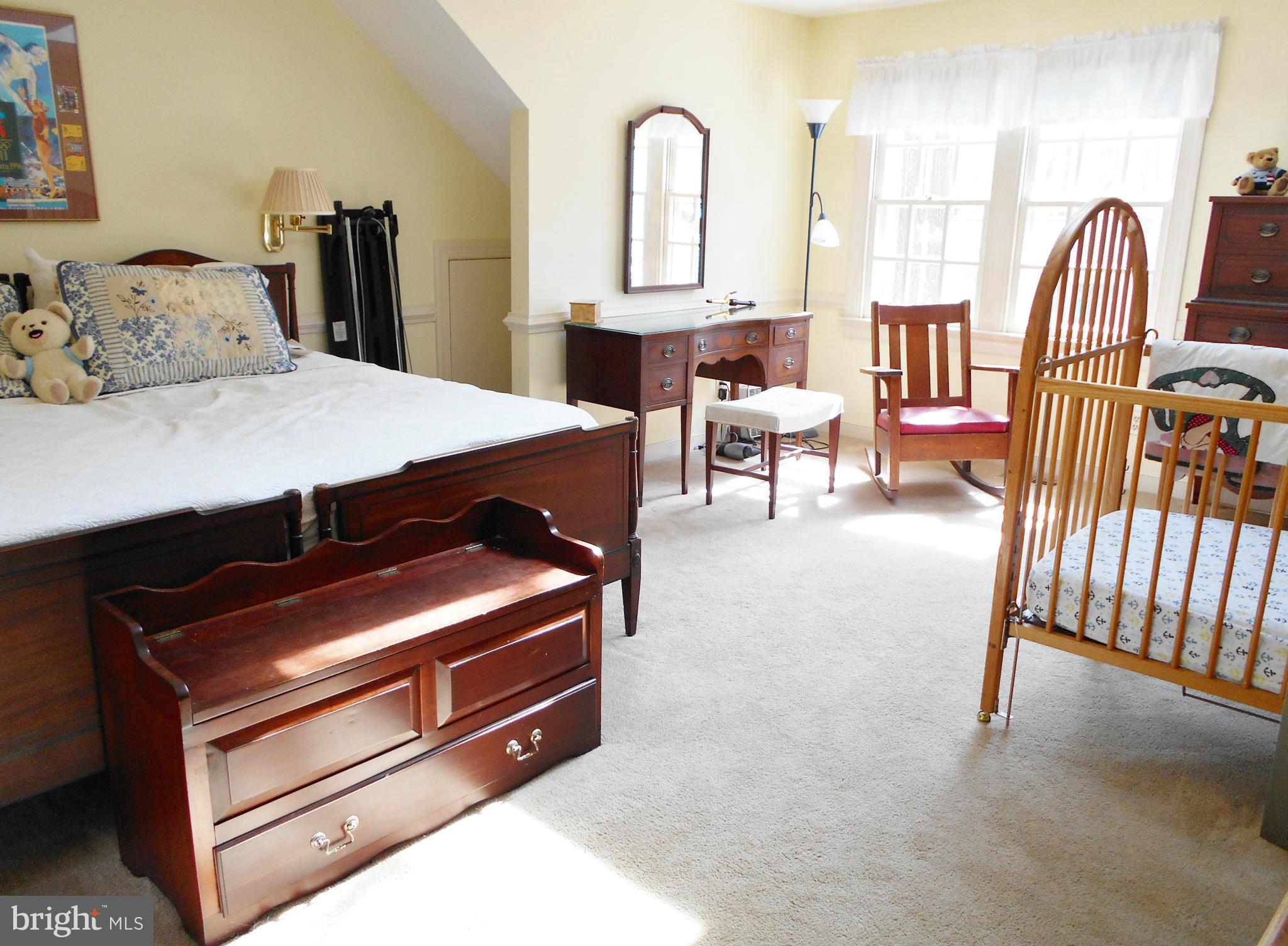 7415 Simms Landing Road Port Tobacco, MD 20677 - Photo 26 of 30 a living room with furniture and a fireplace