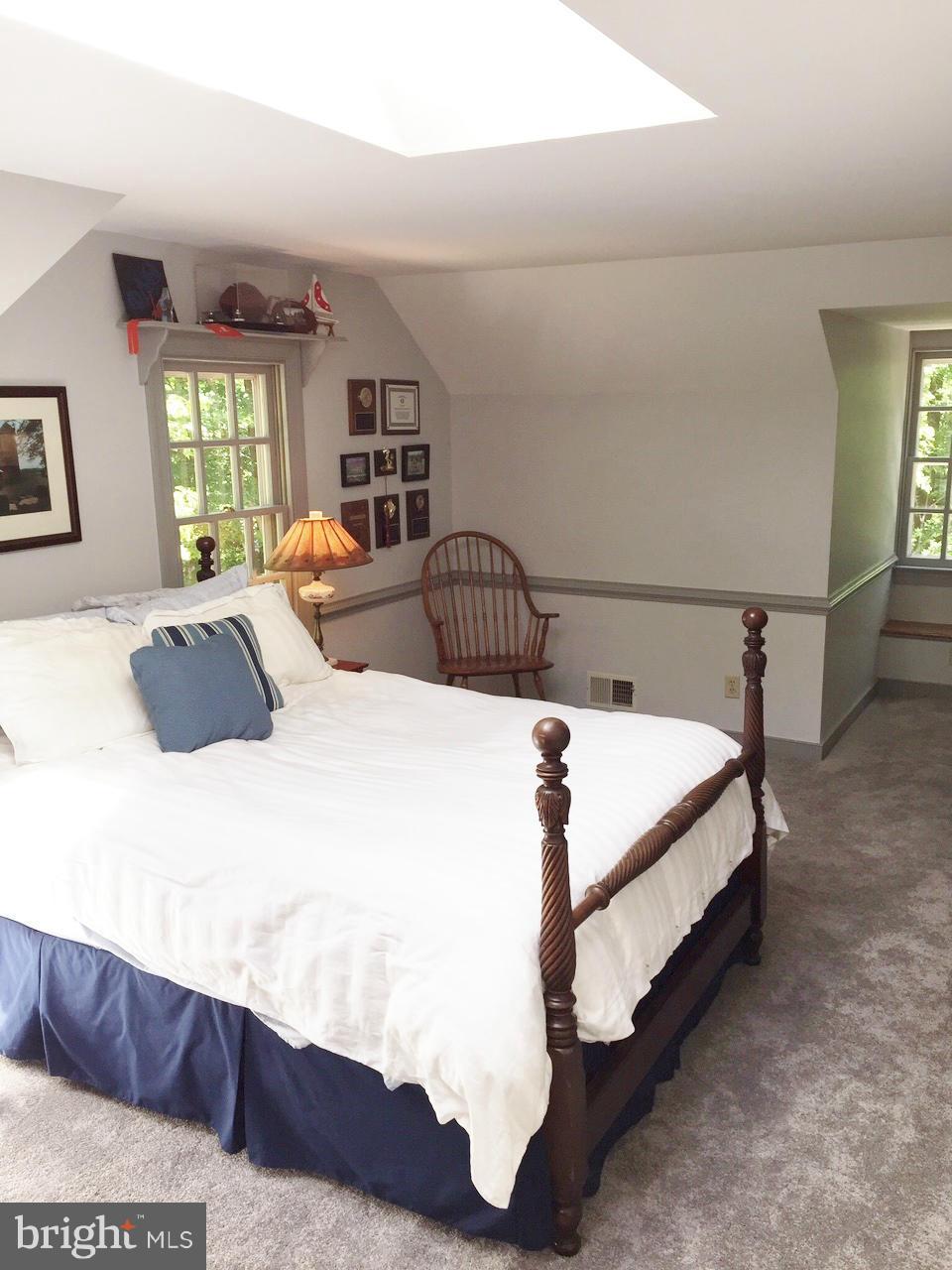 7415 Simms Landing Road Port Tobacco, MD 20677 - Photo 28 of 30 a bedroom with a bed and window