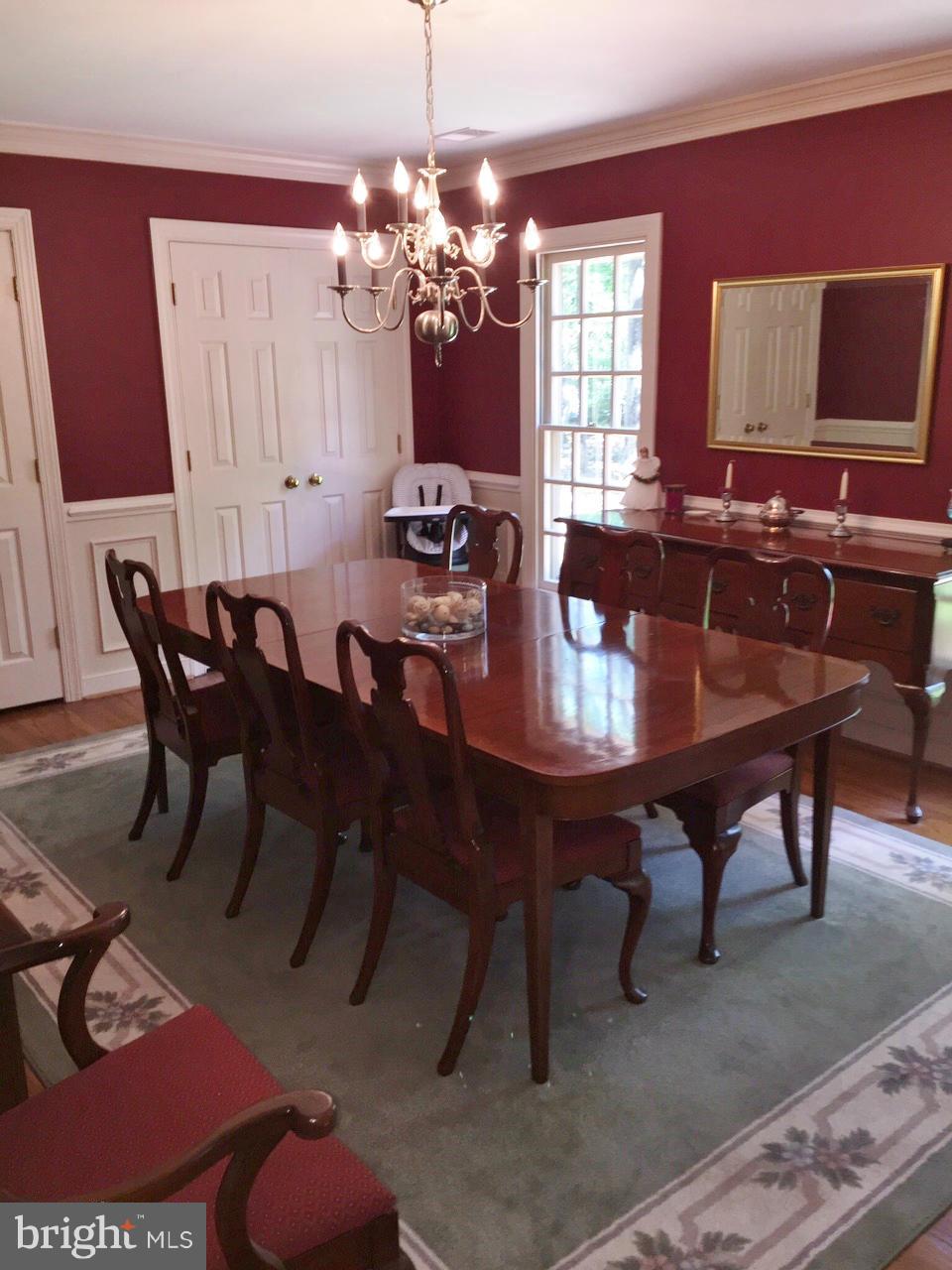 7415 Simms Landing Road Port Tobacco, MD 20677 - Photo 8 of 30 a view of a dining room with furniture