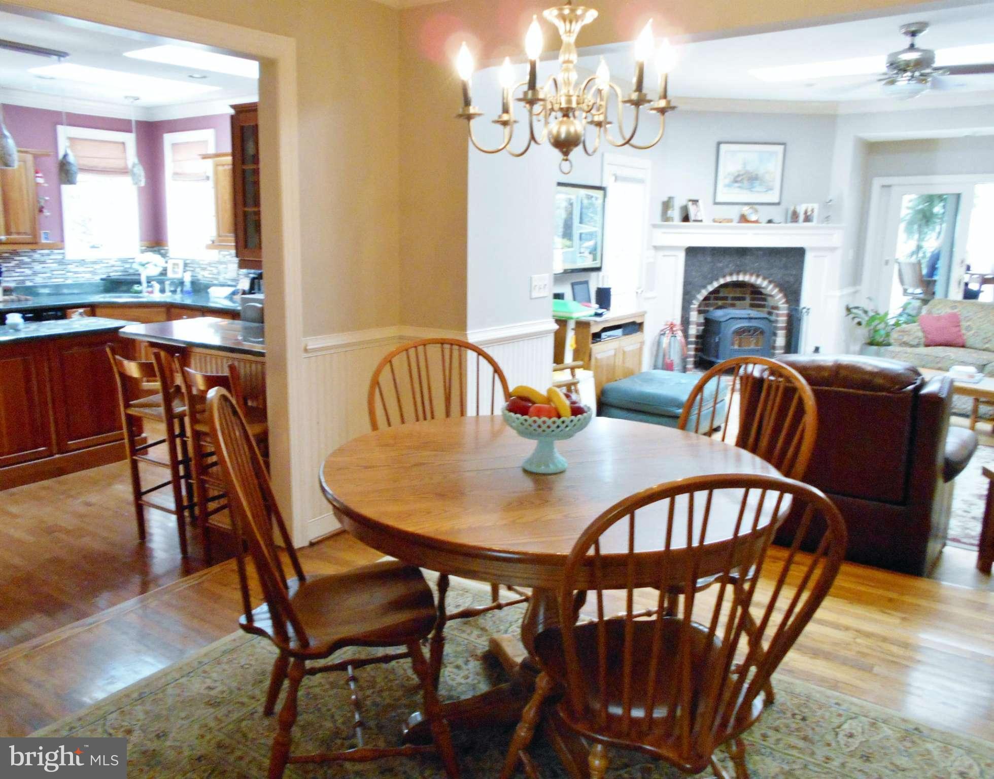7415 Simms Landing Road Port Tobacco, MD 20677 - Photo 10 of 30 a view of a dining room with furniture window and wooden floor