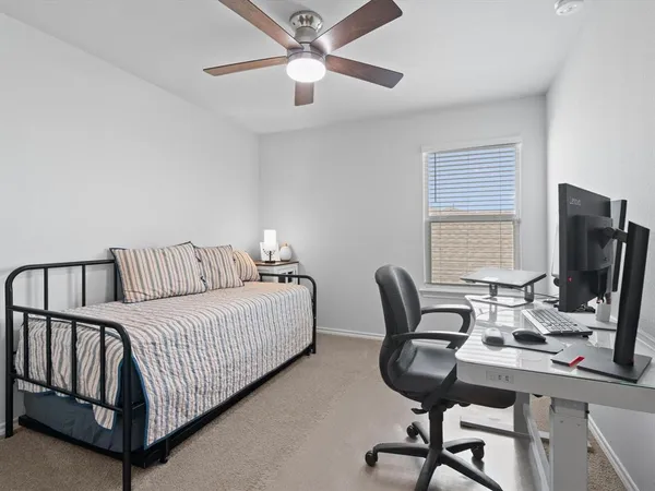 a view of a workspace with furniture