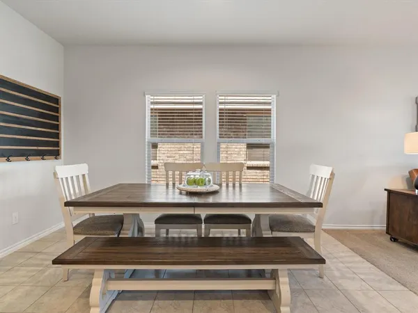 a view of a workspace with furniture