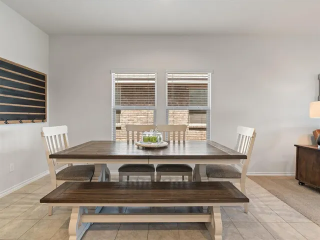 a view of a workspace with furniture