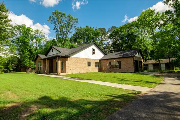 $415,000 | 1608 Southern Oaks Drive, Conroe, TX 77301