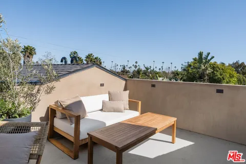 a view of a terrace with a bench