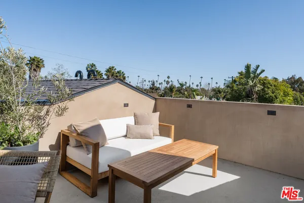 a view of a terrace with a bench