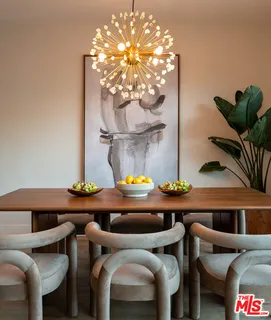 a room with furniture and chandelier