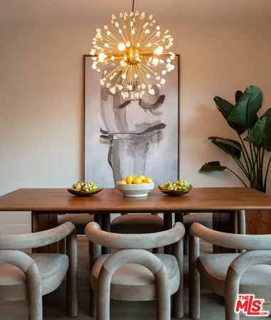 a room with furniture and chandelier