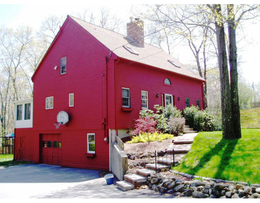 140 Rattlesnake Hill Road Andover, MA 01810 - Photo 1 of 11 a front view of a house with a yard