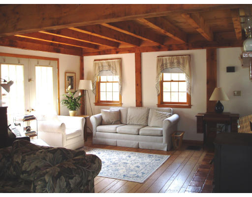 140 Rattlesnake Hill Road Andover, MA 01810 - Photo 7 of 11 a living room with furniture and wooden floor