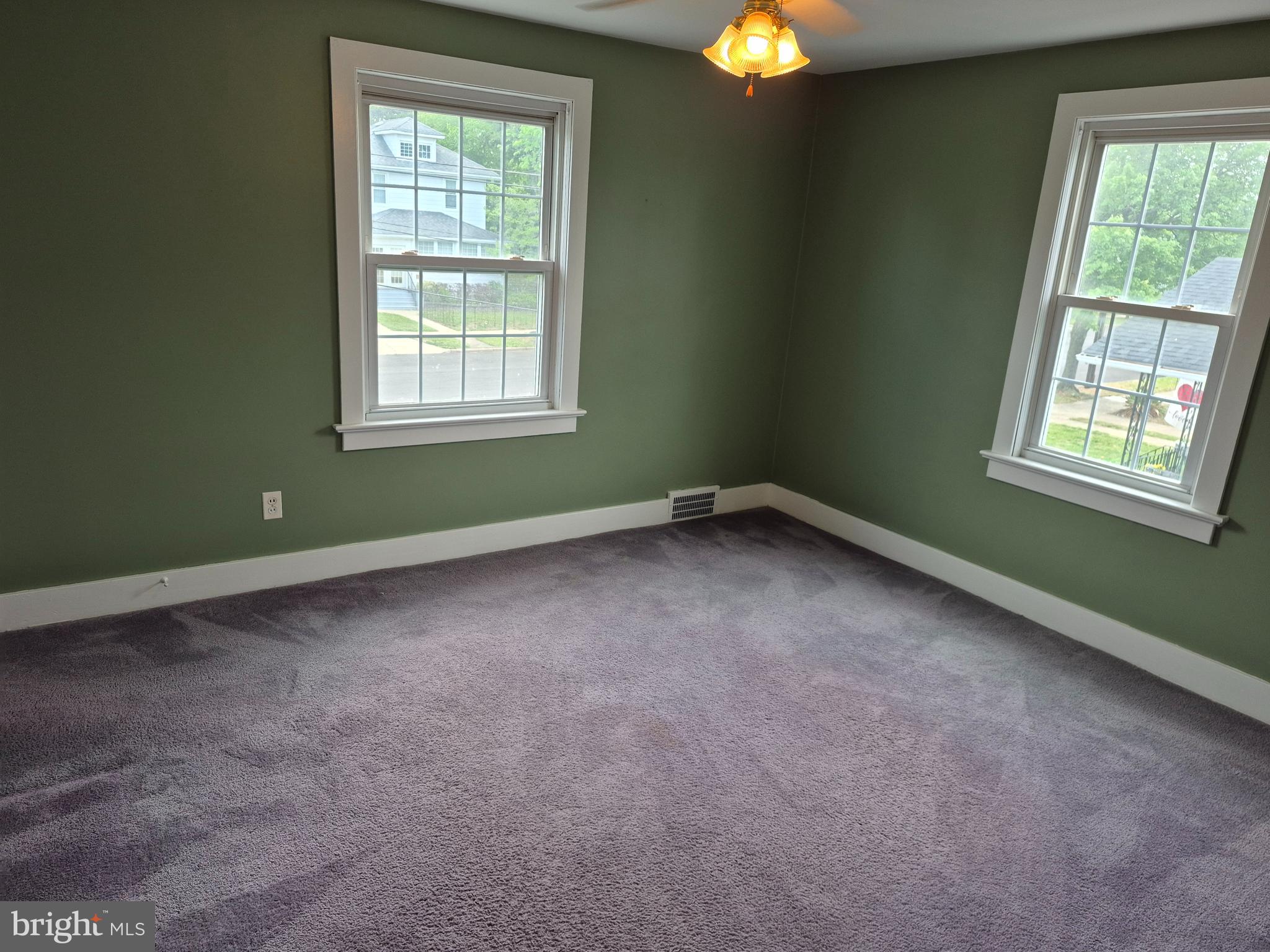 304 Lippincott Avenue Riverside, NJ 08075 - Photo 23 of 33 an empty room with windows and chandelier fan