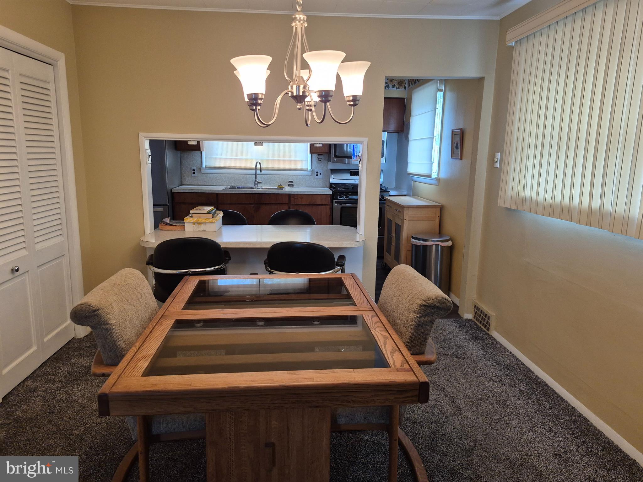 304 Lippincott Avenue Riverside, NJ 08075 - Photo 9 of 33 a view of hall way with furniture and chandelier