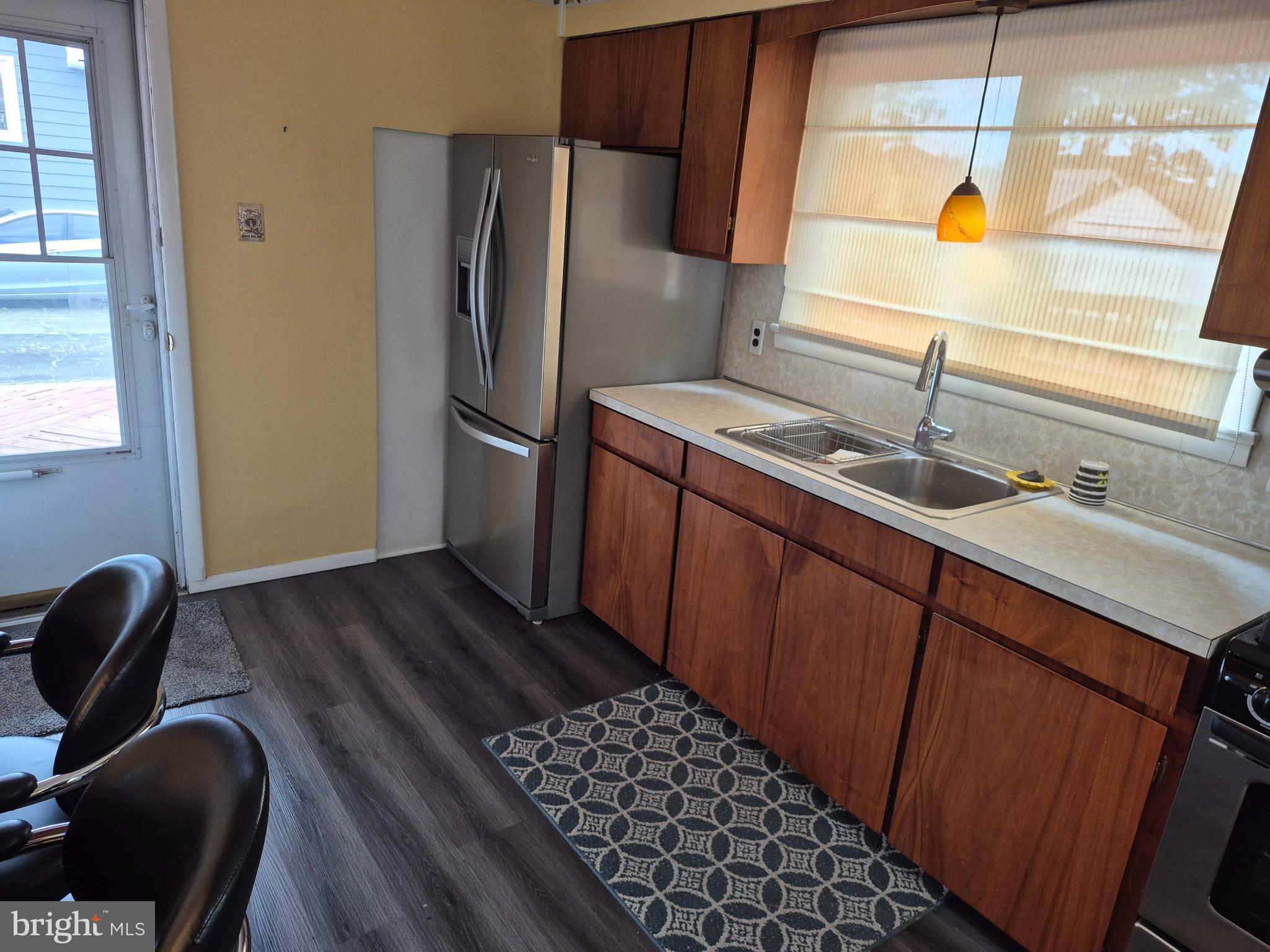 304 Lippincott Avenue Riverside, NJ 08075 - Photo 10 of 33 a kitchen with sink and refrigerator