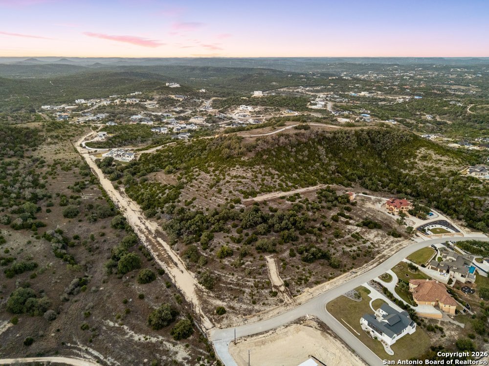 22977 Stallion Ridge San Antonio, TX 78255 - Photo 11 of 11 an aerial view of residential houses with city view