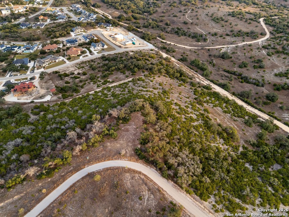22977 Stallion Ridge San Antonio, TX 78255 - Photo 4 of 11 a view of a yard