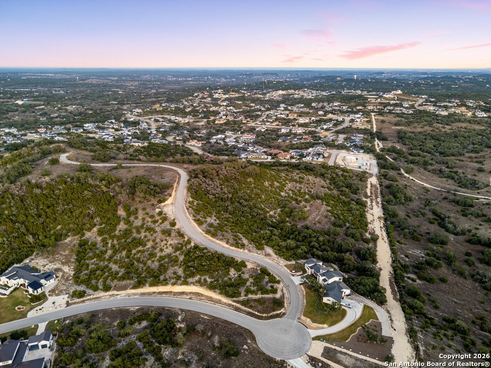 22977 Stallion Ridge San Antonio, TX 78255 - Photo 7 of 11 an aerial view of residential houses with outdoor space